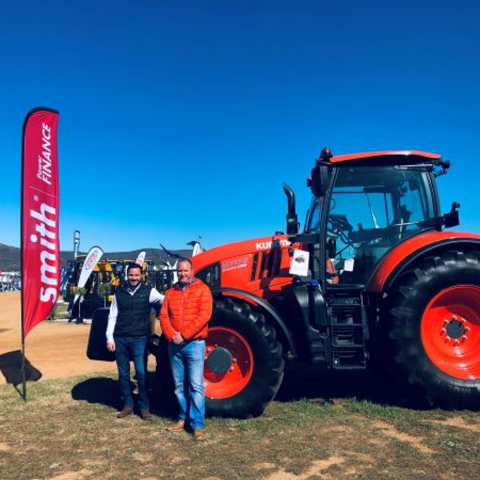 Kubota National Sales Manager Dieter Bergmann Spe Director Tom Bloom At Nampo Cape 19 In Front Of The Kubota M7 172 002 Farmers Review Africa