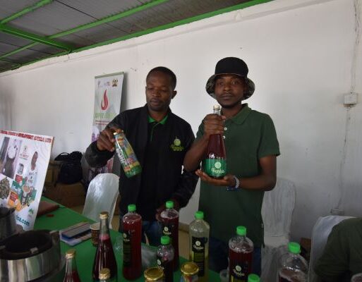 James Lito Handas Juice Manager and Aluda Misoga display their products during Nairobi International Trade Fair. Photo by Zablon Oyugi (002)