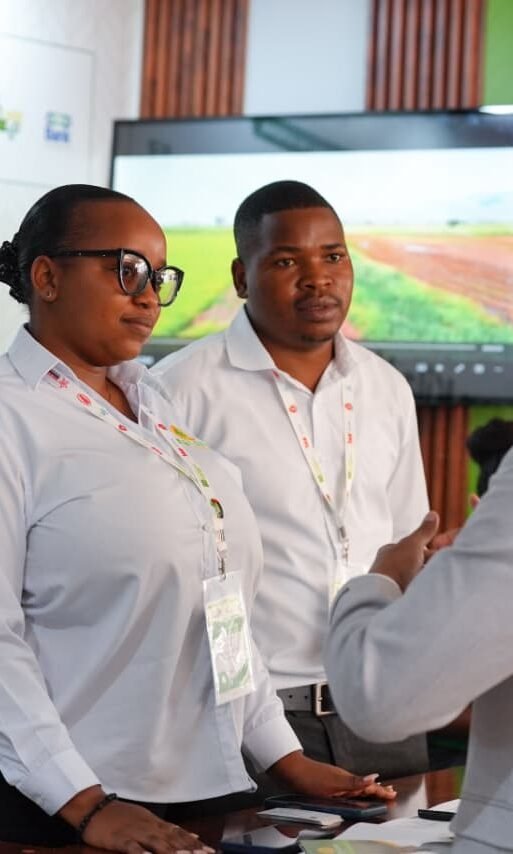 Agricom Represenatatives engaging with a Farmer