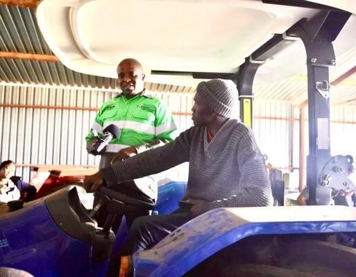 MEC Madoda Sambatha with local farmer and beneficiary, Ramasimane Kalaote. The shared-service tractor is set to support farmers across Tigane by improving access to mechanised farming services.